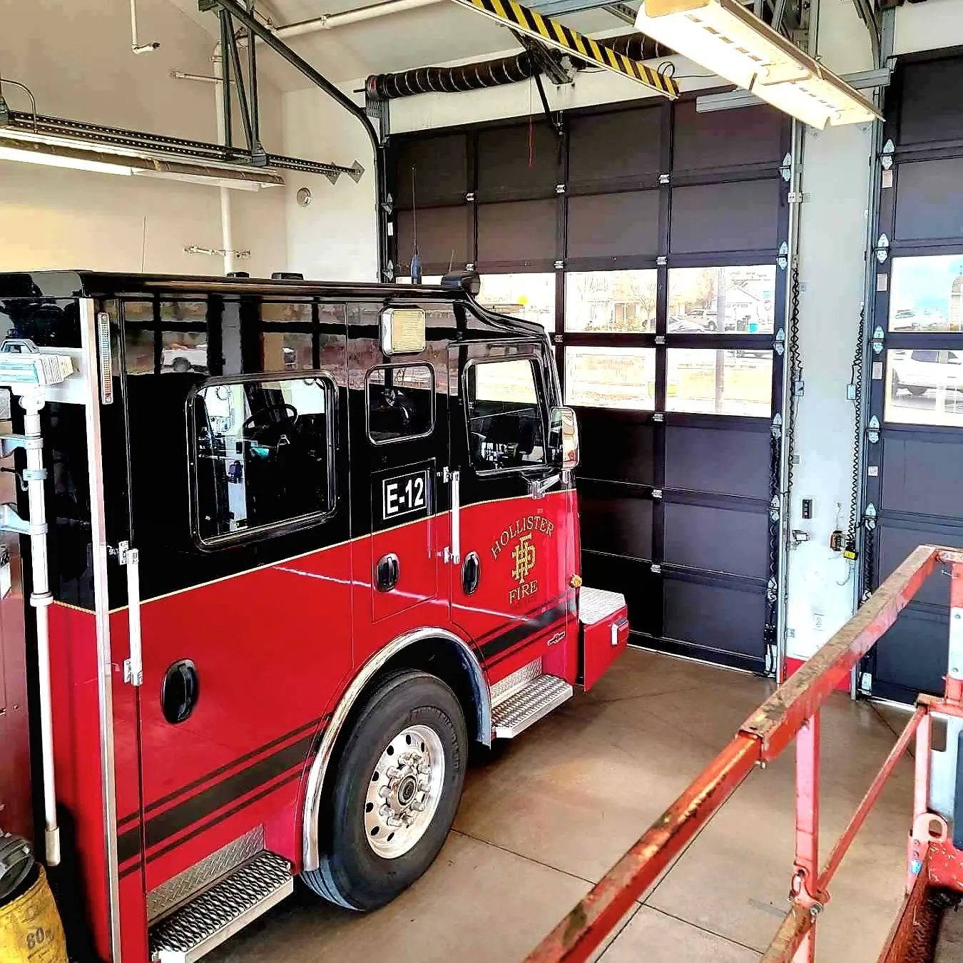 Fire-station apparatus-bay overhead doors