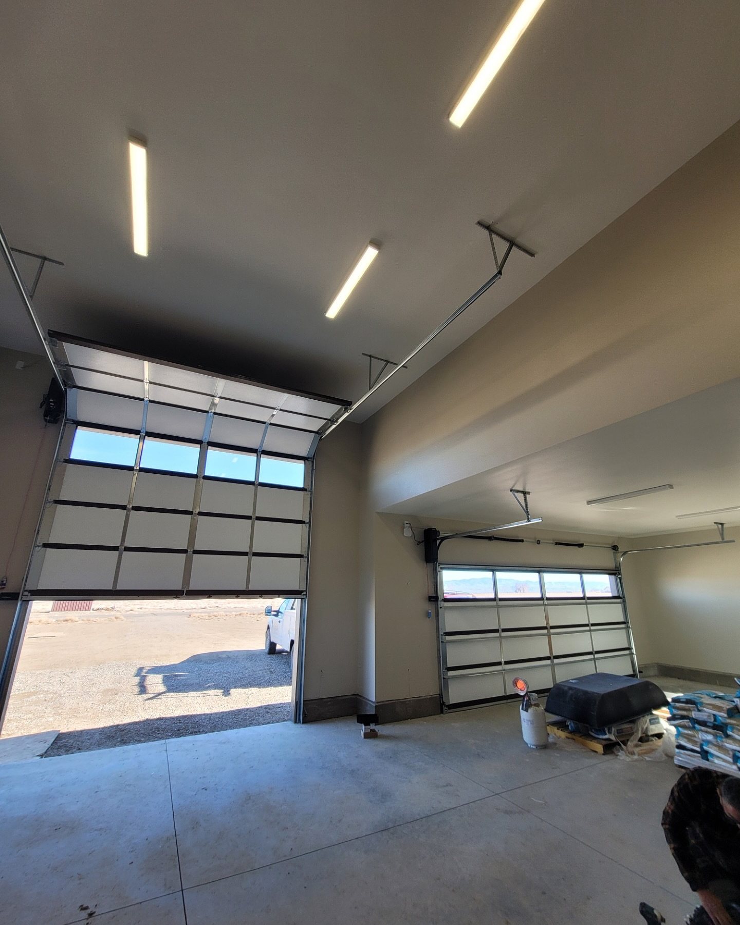 Interior garage door opener and track installation