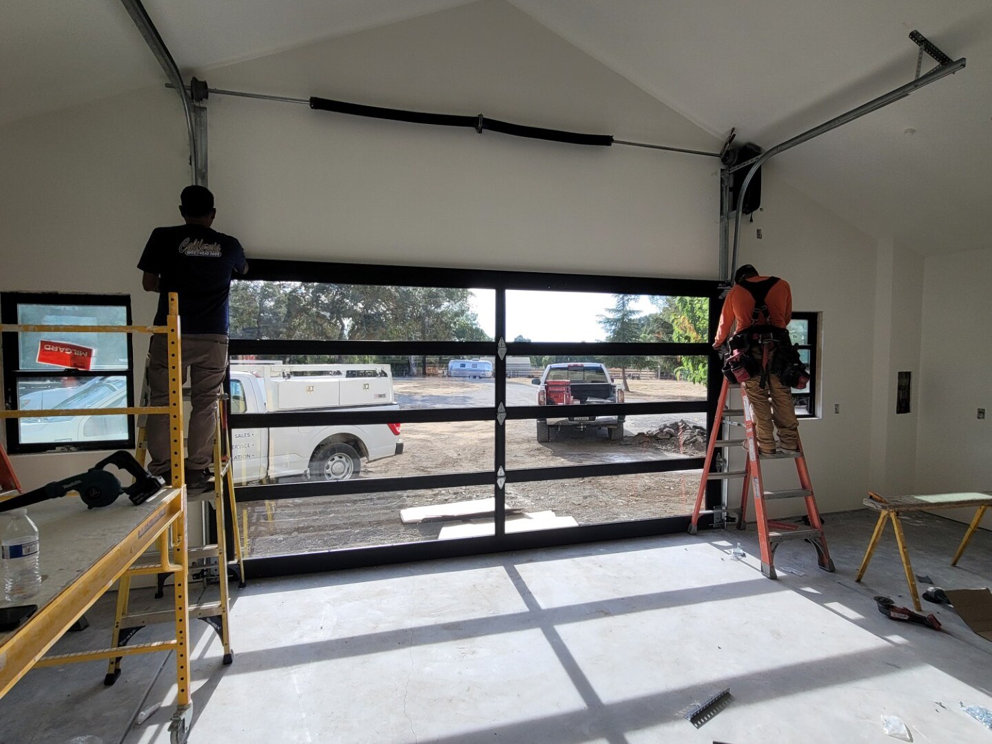 Full-view glass residential garage door installed by California Overhead Door