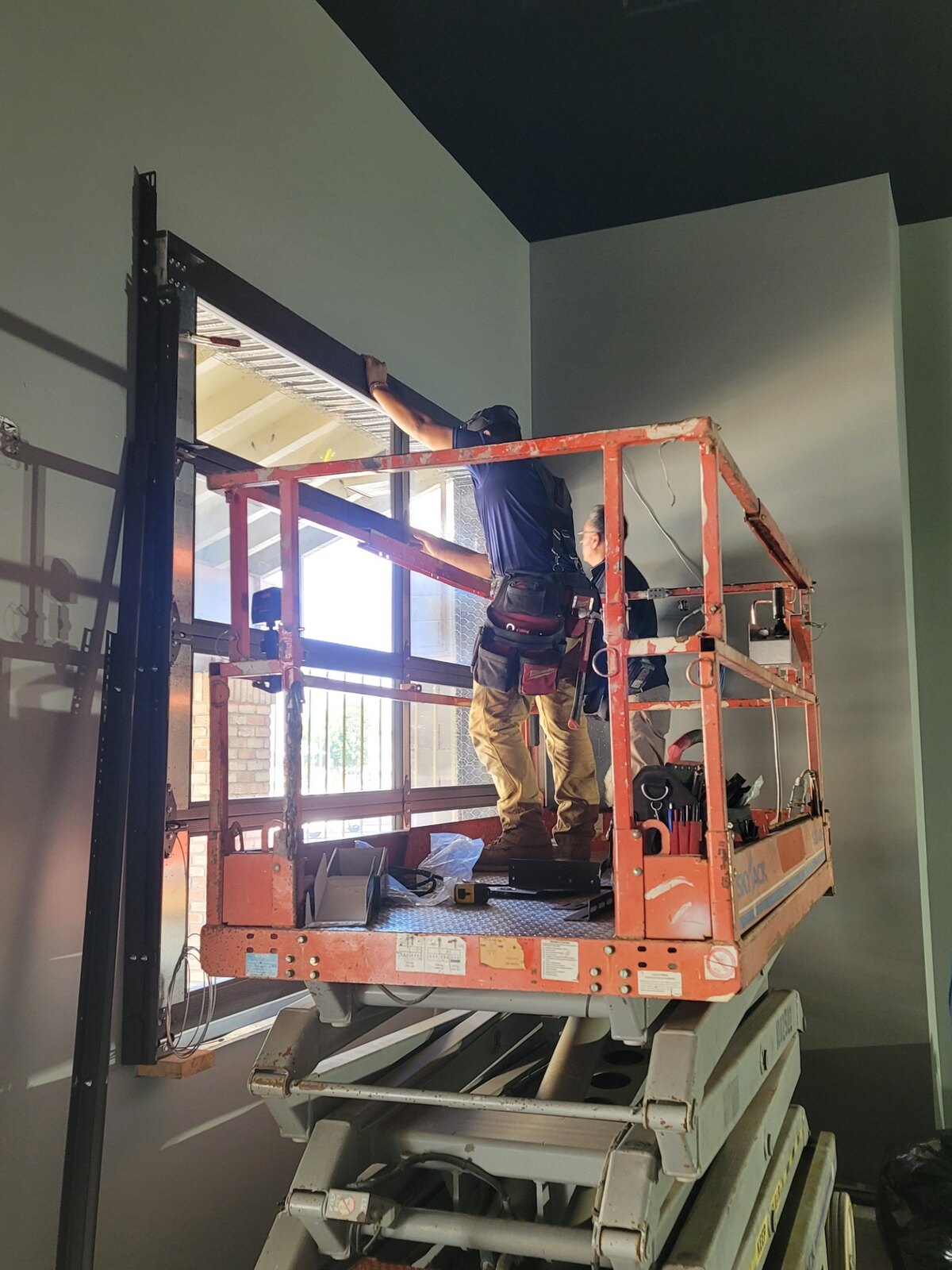Installing a full-view glass commercial overhead door