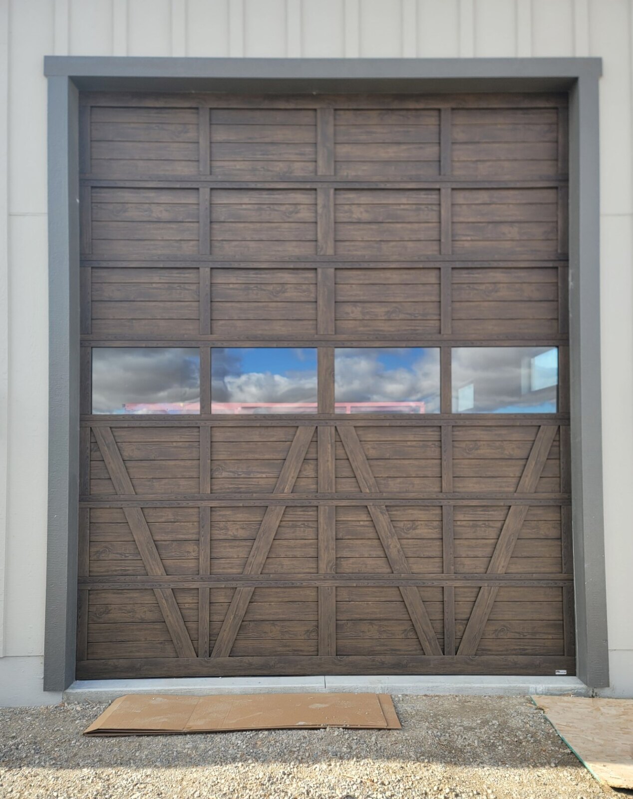 Commercial sectional overhead door with window panels