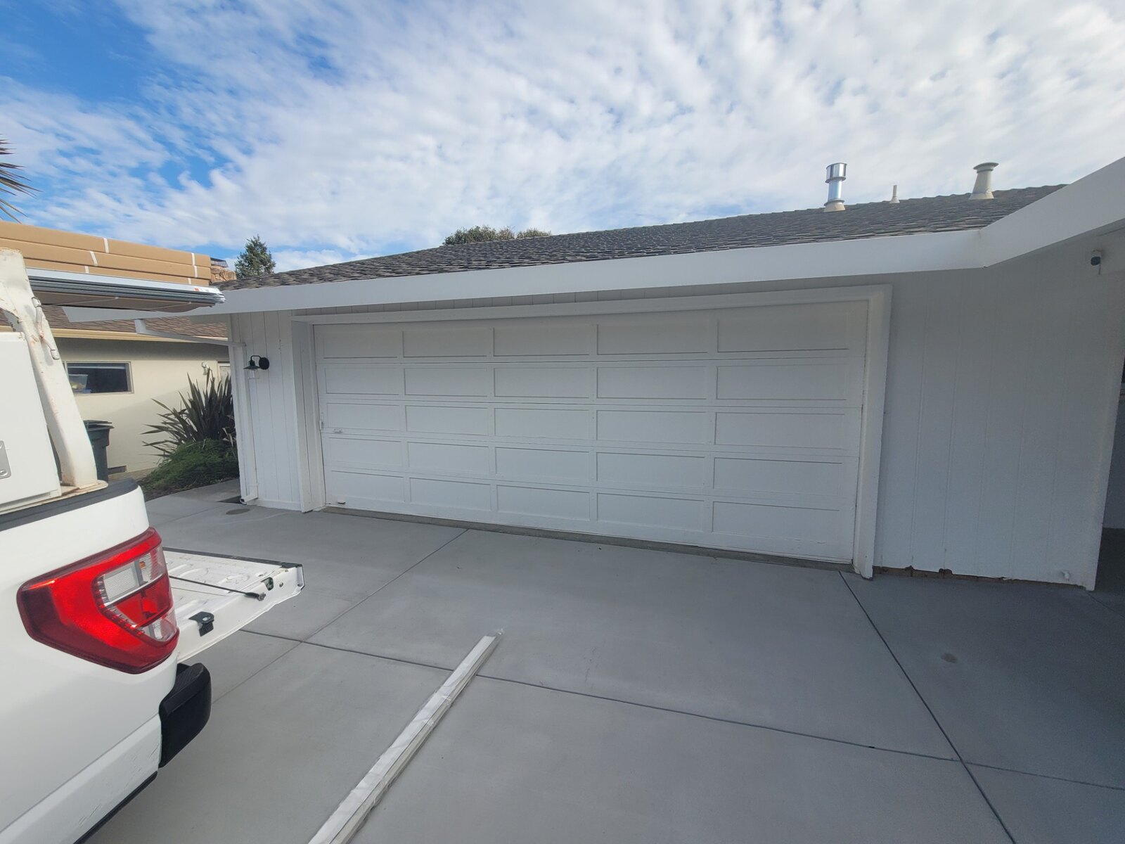 New white garage door on a Central Coast home