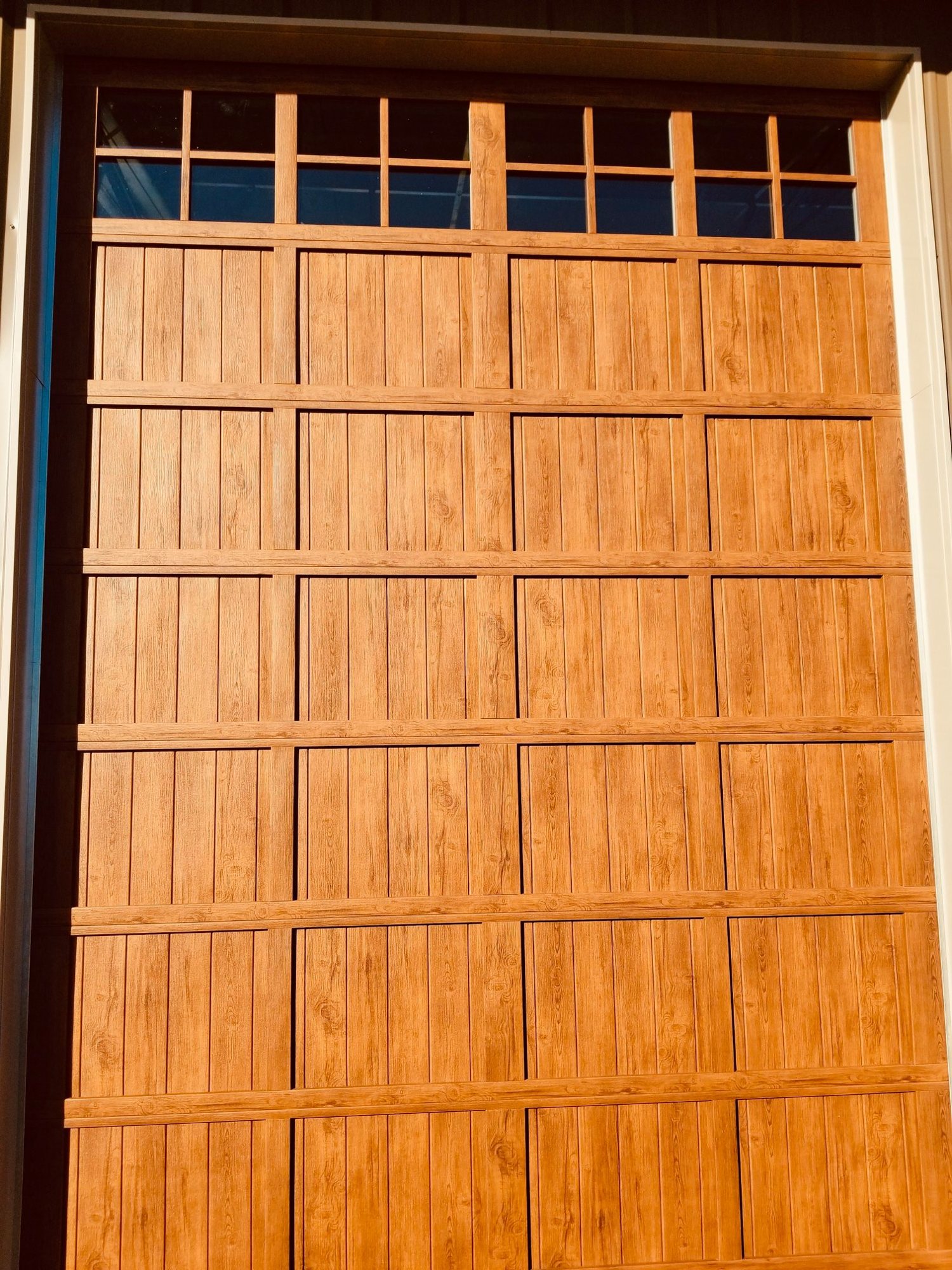 Custom stained-wood carriage garage door, detail