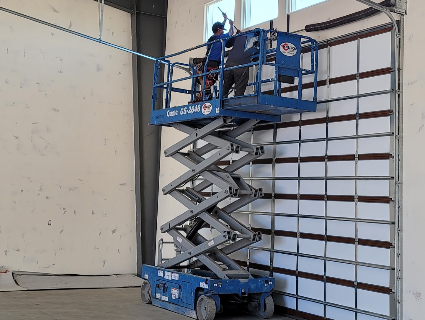 California Overhead Door technicians on a job site