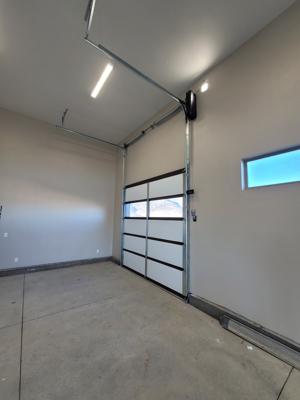 Commercial full-view glass overhead door, interior