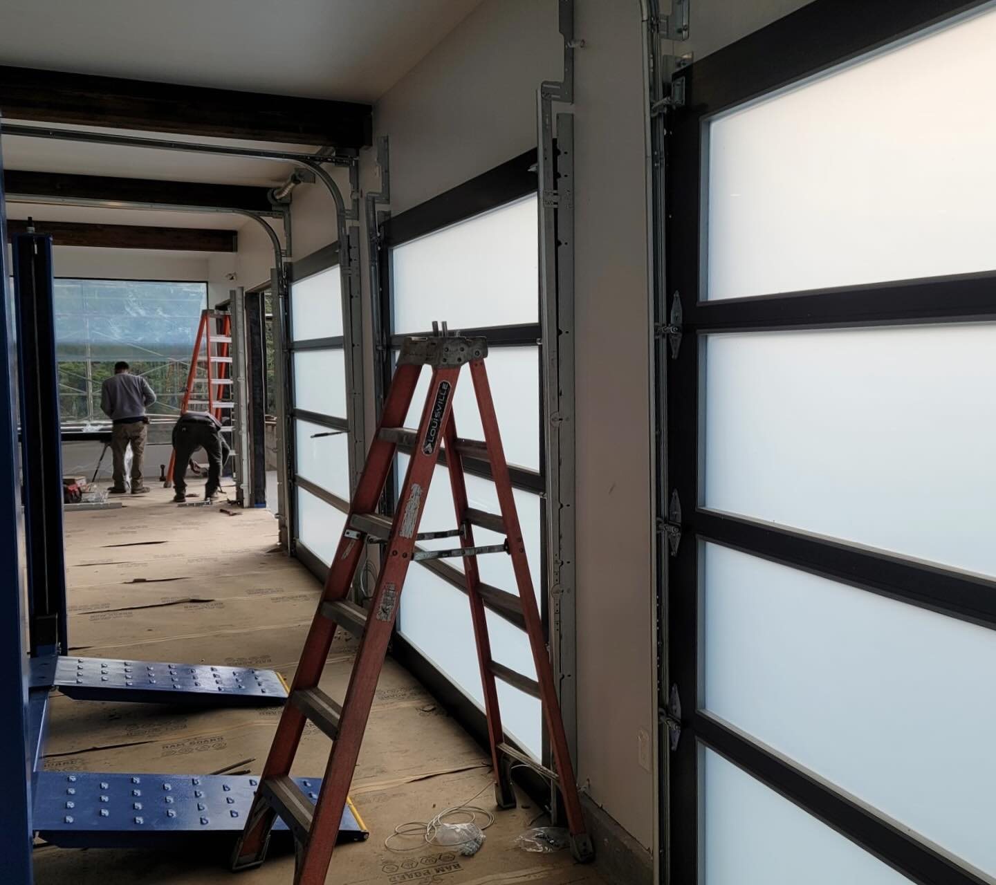 Full-view glass and aluminum garage doors
