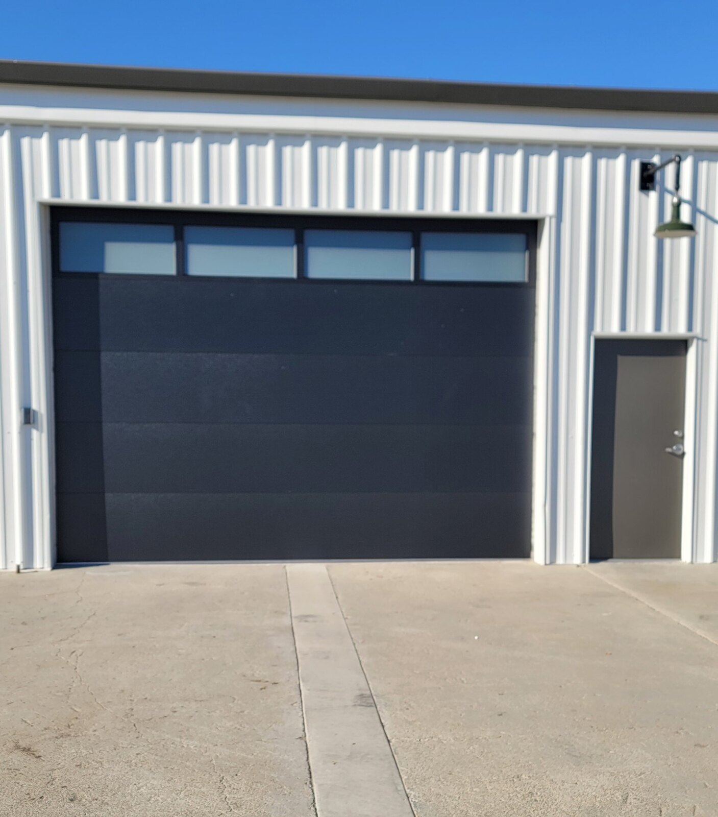 Modern charcoal commercial sectional overhead door