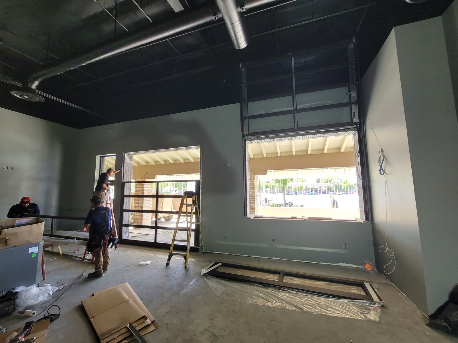 Full-view glass commercial overhead door, interior