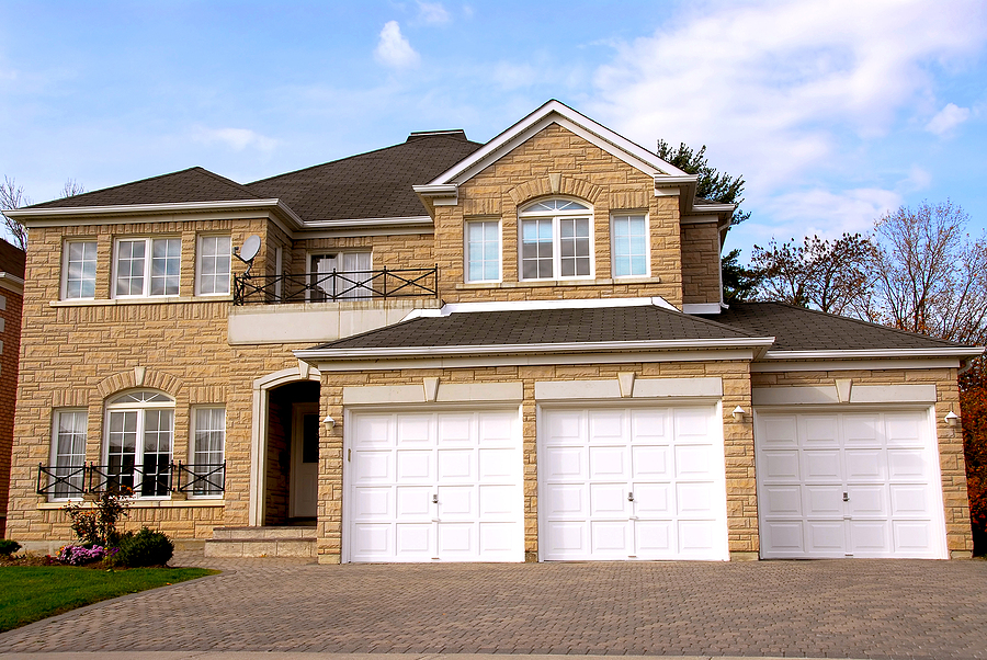 house with residential garage doors